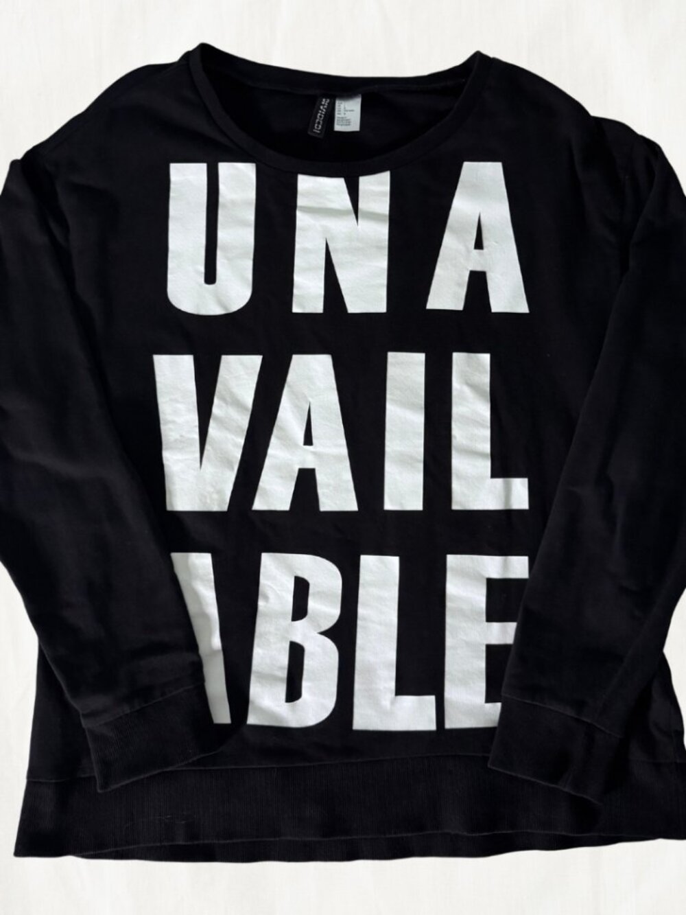H&M DIVIDED: “Unavailable” Graphic Sweatshirt